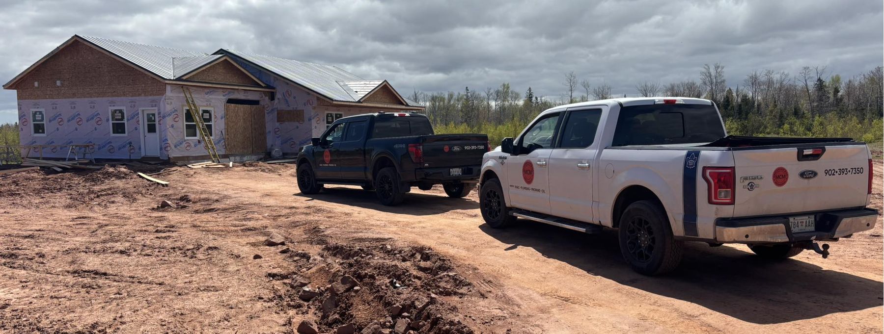 MacCormack & Co trucks at a new build